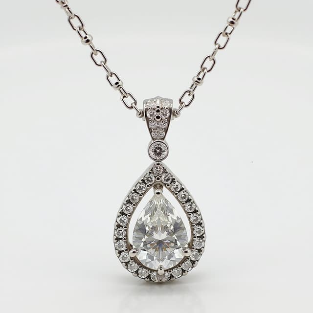 Elegant diamond necklace with a teardrop pendant and white gold chain