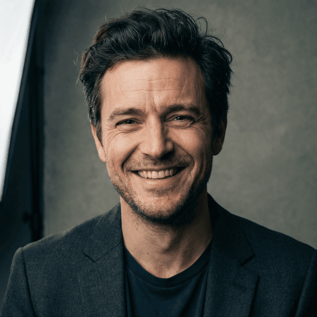 Actor headshot with expressive features and professional lighting