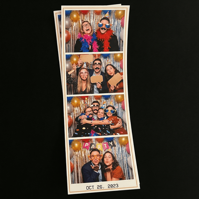 Fun photo booth style image, colorful backdrop, party props like hats and glasses, multiple fun poses, strip format, playful lighting, celebration atmosphere
