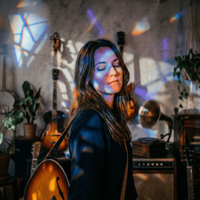 Musician headshot with artistic expression and creative lighting