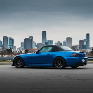 Blue Honda S2000 with Enkai RPF1 Wheels - City View