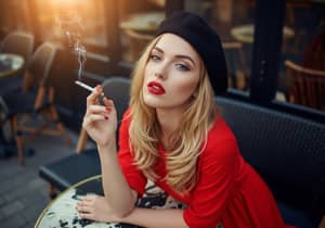 Beautiful Woman with Red Lips and Cigarette
