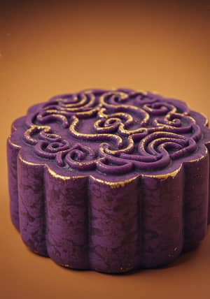 Vintage Purple Moon Cake with Intricate Details