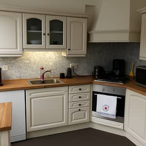 Modern Kitchen Design with Dishwasher and Wooden Countertop