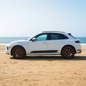 White Porsche Macan with Tinted Windows in Malibu