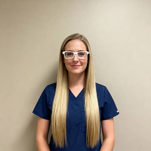 Blue Uniformed Nurse with Blonde Hair Blue Uniformed Nurse with Blonde Hair