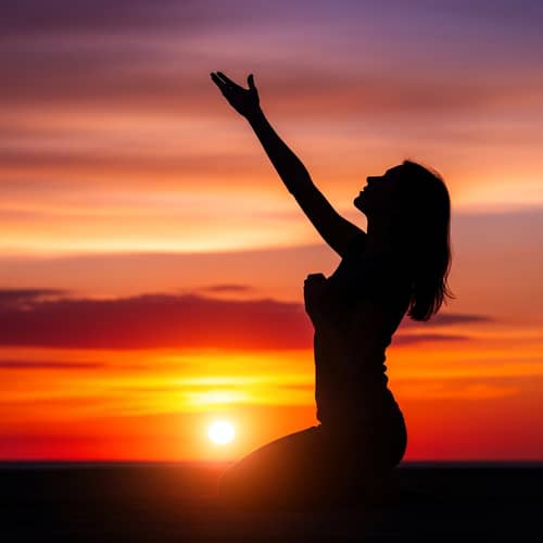 Woman Silhouette Kneeling with Hand on Chest