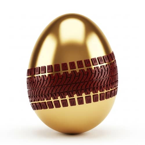 Golden Easter Egg with Dark Red Tire Tread Zigzag Pattern - Shiny Metallic Style
