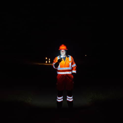 Realistic Orange and Fluorescent Work Uniform Glowing in the Dark