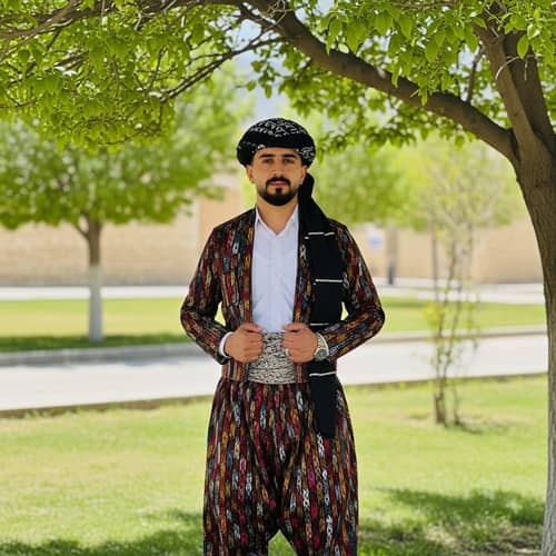 Traditional Kurdish Clothing: Vibrant Attire of a Kurdish Man