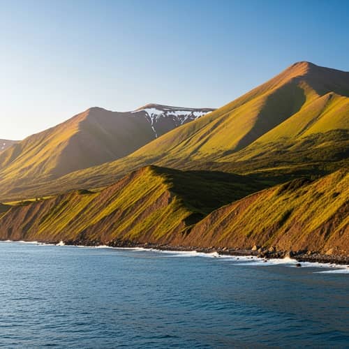 Serene Sea and Majestic Mountains Landscape