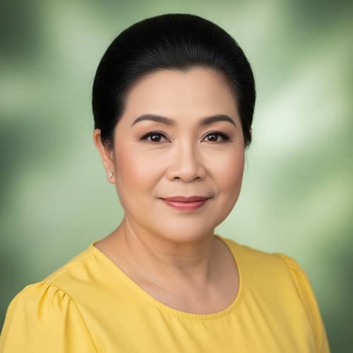 Middle-Aged Southeast Asian Woman Portrait in Yellow Blouse
