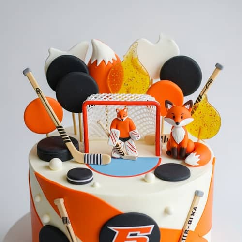 Cartoon-Inspired Ice Hockey Character Cake with Fox Tail Charm