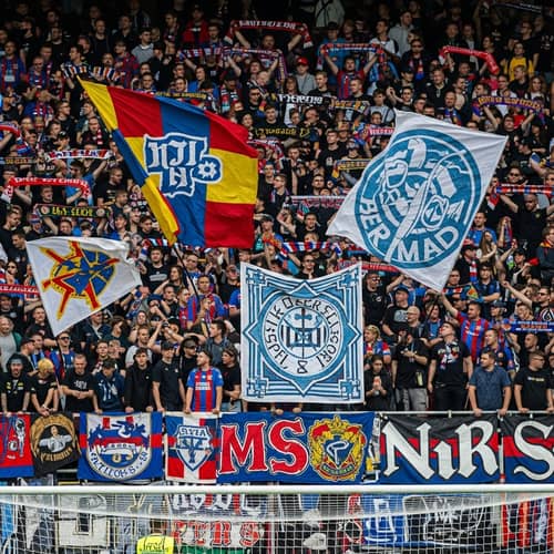 Enthusiastic Soccer Ultras in Packed Stadium