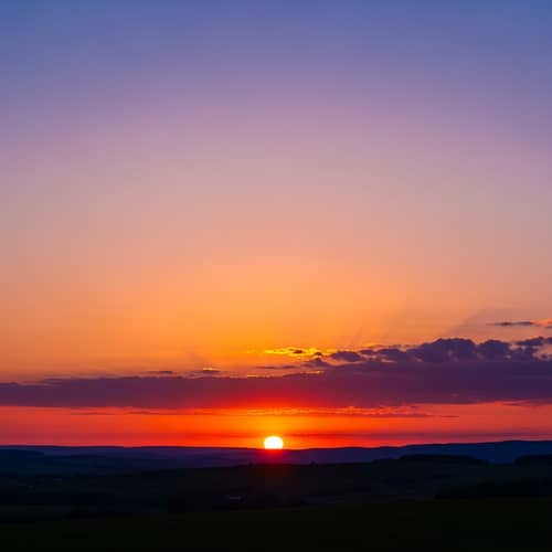 Spectacular Sunset Sky with Vibrant Orange and Purple Hues
