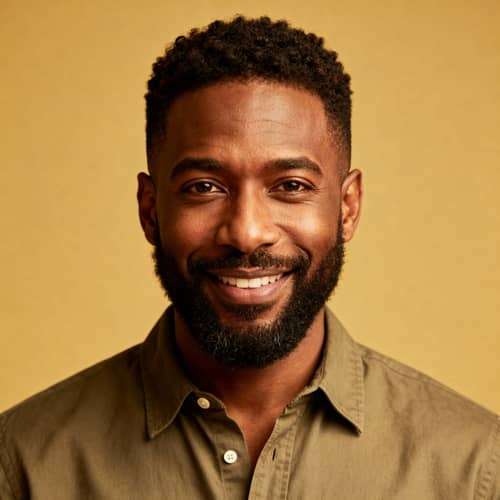 Friendly Portrait of a Black Man in Casual Attire Friendly Portrait of a Black Man in Casual Attire