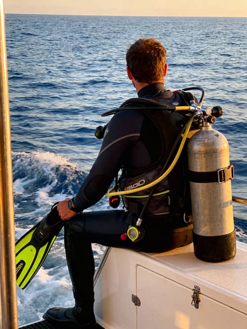 Ready for Adventure: Scuba Diver Boat Dive Prep