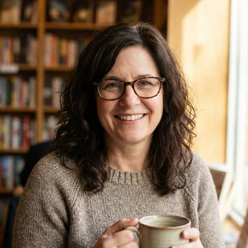 Elegant Woman in Her 50s with Brown Hair and Glasses Elegant Woman in Her 50s with Brown Hair and Glasses
