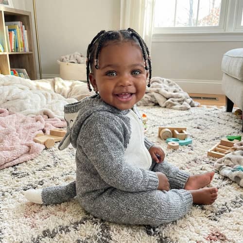 Adorable Black Baby Girl in Stylish Wolf Onesie