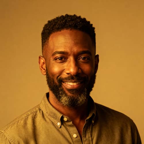 Warm Portrait of a Black Man in Casual Attire Warm Portrait of a Black Man in Casual Attire