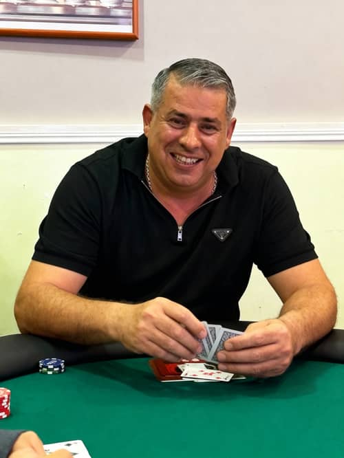 Poker Player at the Table with Cards Poker Player at the Table with Cards