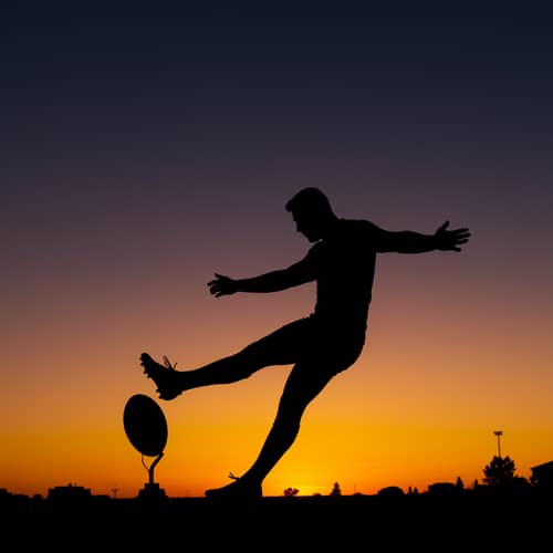 Rugby Player Kicking Ball - Silhouette Art