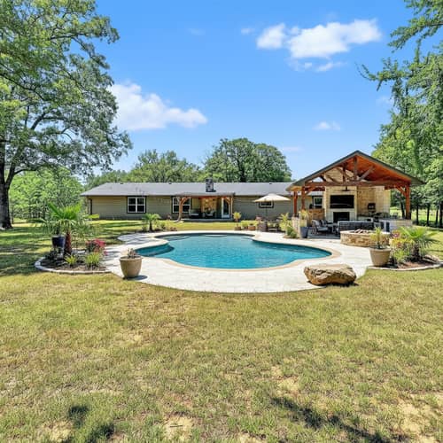 Stylish Swimming Pool and Outdoor Entertainment Area Stylish Swimming Pool and Outdoor Entertainment Area