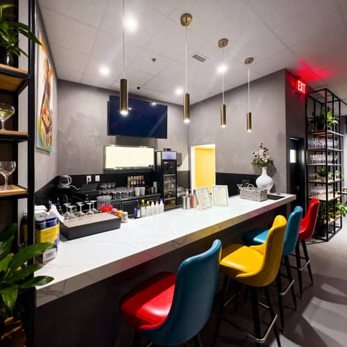 Modern Bar Design with Sensual Lighting & Art