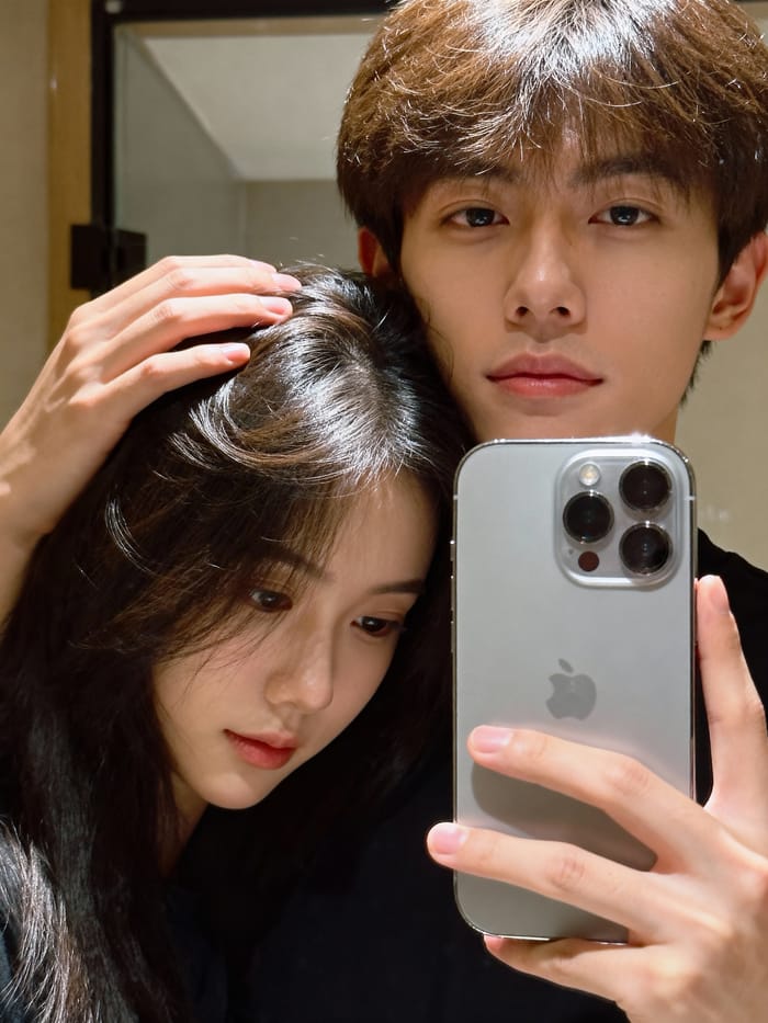 Romantic Mirror Moment: Couple's Sweet Embrace Romantic Mirror Moment: Couple's Sweet Embrace