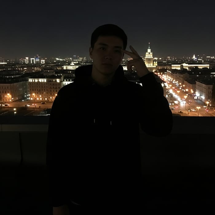 Man Contemplating on Moscow Rooftop at Night Man Contemplating on Moscow Rooftop at Night