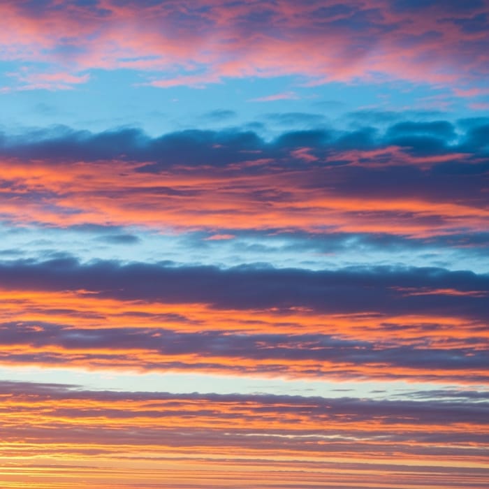 Stunning Sunset Sky: White-Blue-Pink-Orange Clouds
