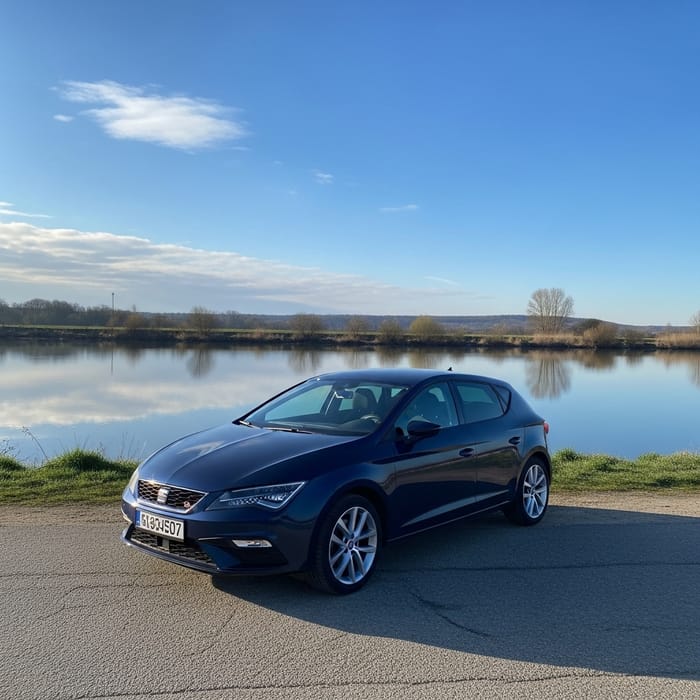 Dark Blue Seat Leon Parked by Tranquil Riverside - Captivating HD Image Dark Blue Seat Leon Parked by Tranquil Riverside - Captivating HD Image
