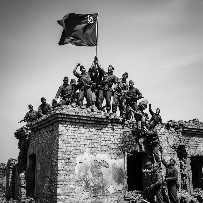 1945 Victory: Red Flag Raised by Soviet Soldiers at Reichstag