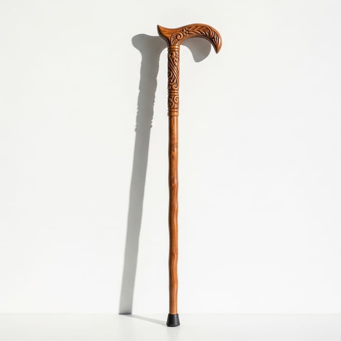 Handcrafted Wooden Cane with Elegant Carvings Handcrafted Wooden Cane with Elegant Carvings