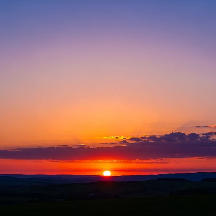 Spectacular Sunset with Vibrant Orange, Pink, and Purple Hues