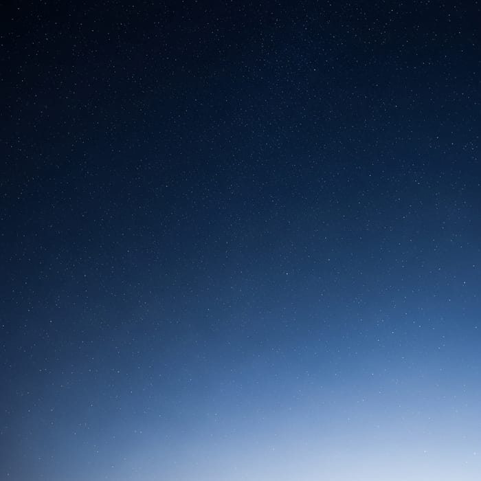 Serenity in Blue: Tranquil Night Sky with Sparkling Stars Serenity in Blue: Tranquil Night Sky with Sparkling Stars
