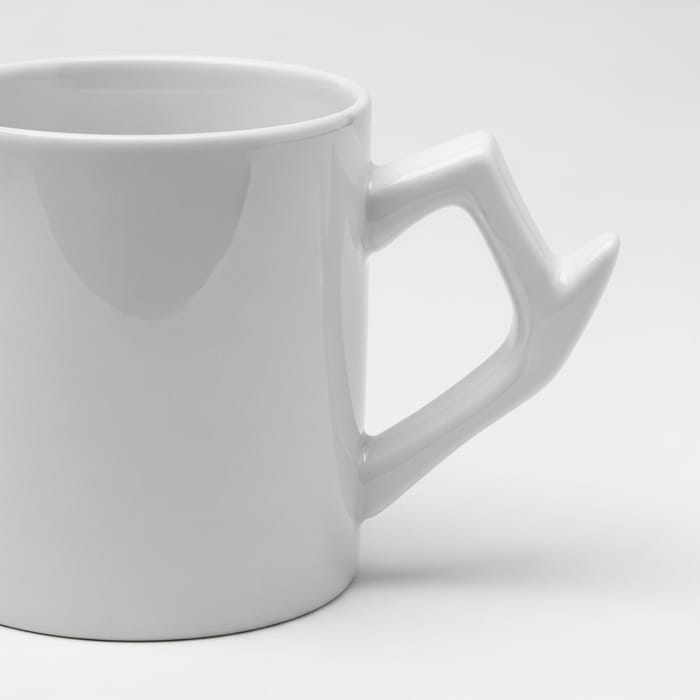 White Ceramic Mug with Distinctive Handle Design