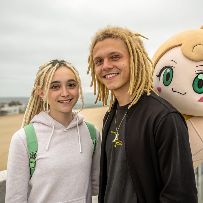 Blonde Girl with Green and Brown Eyes & Rasta Boy