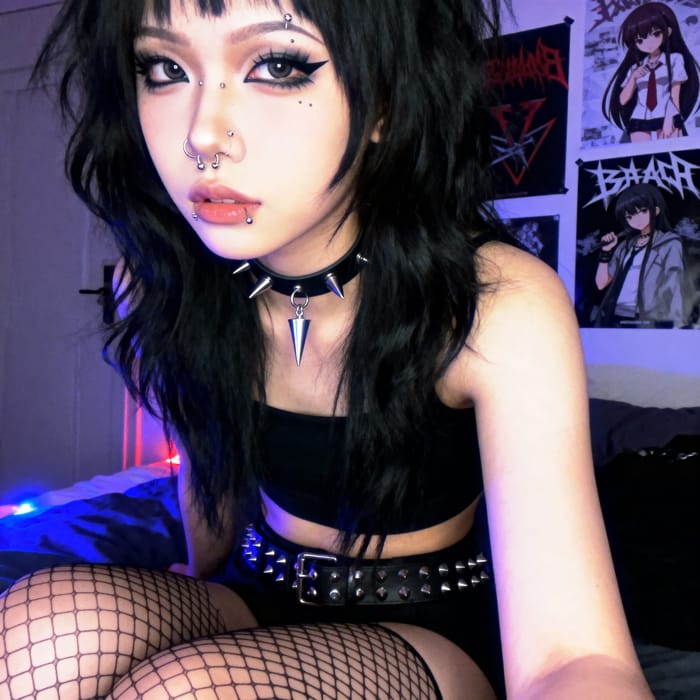 Stylish Emo Girl with Black Hair and Piercings