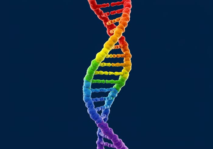 Rainbow-Colored DNA on Blue Background