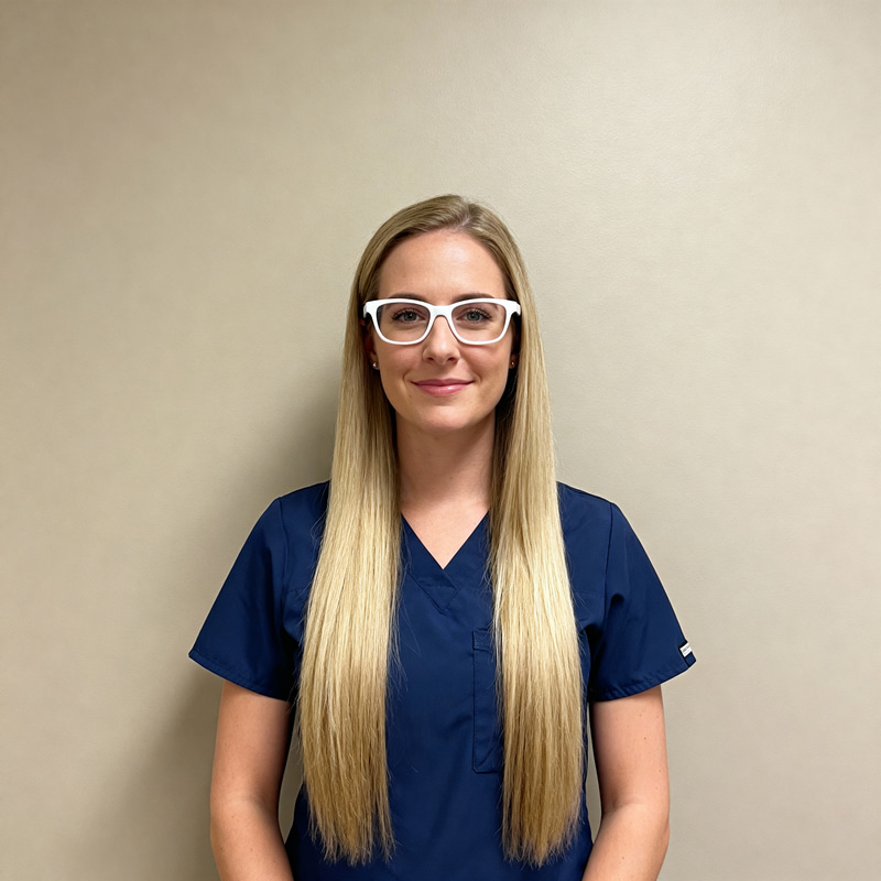 Blue Uniformed Nurse with Blonde Hair Blue Uniformed Nurse with Blonde Hair