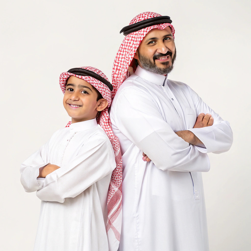 Father and Son in Traditional Saudi Attire