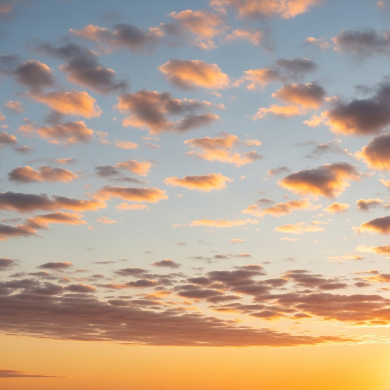 Soft Cozy Realistic Sunset with White-Orange Clouds