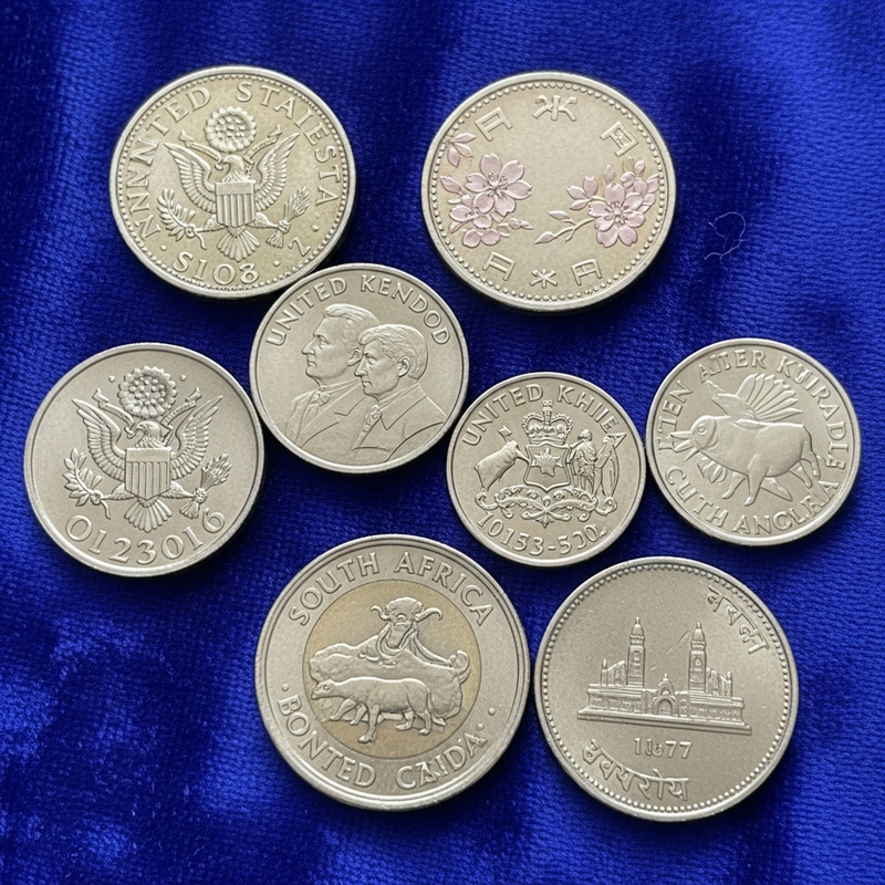 Official Coins: Global Collection on Blue Velvet Fabric Featuring Distinctive Coins from Various Countries Official Coins: Global Collection on Blue Velvet Fabric Featuring Distinctive Coins from Various Countries