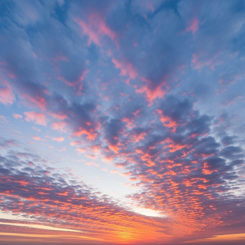 Sunset Sky with White-Blue, Pink, and Orange Clouds