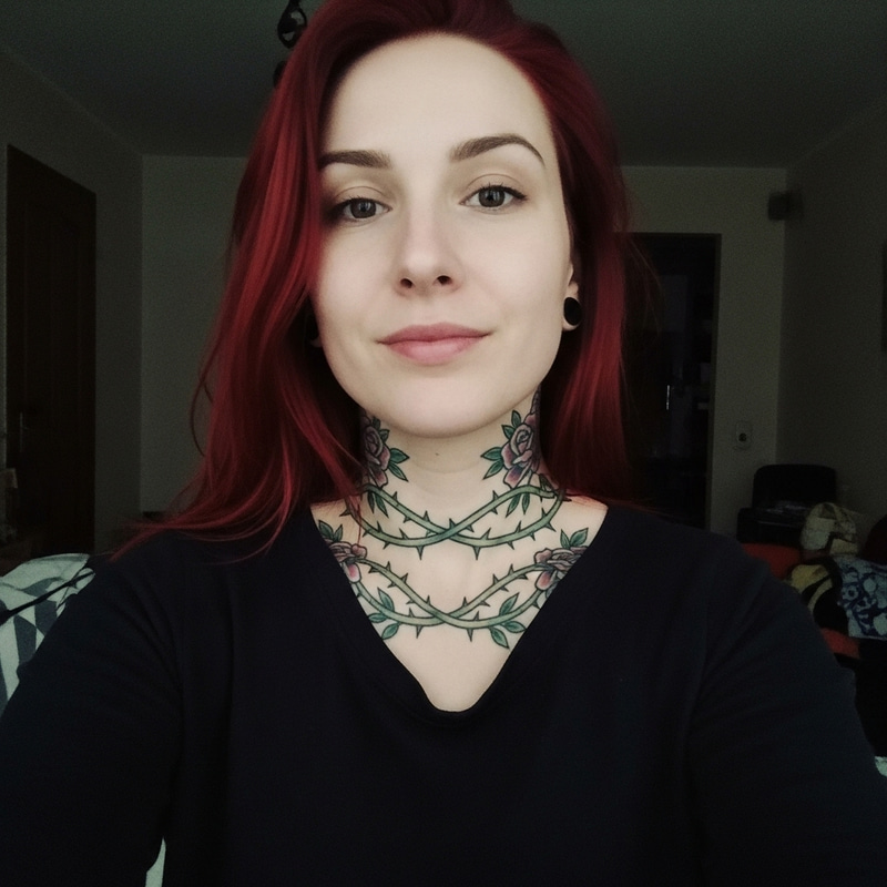 Stylish Red-Haired Woman with Neck Tattoo in Low-Quality Selfie Stylish Red-Haired Woman with Neck Tattoo in Low-Quality Selfie