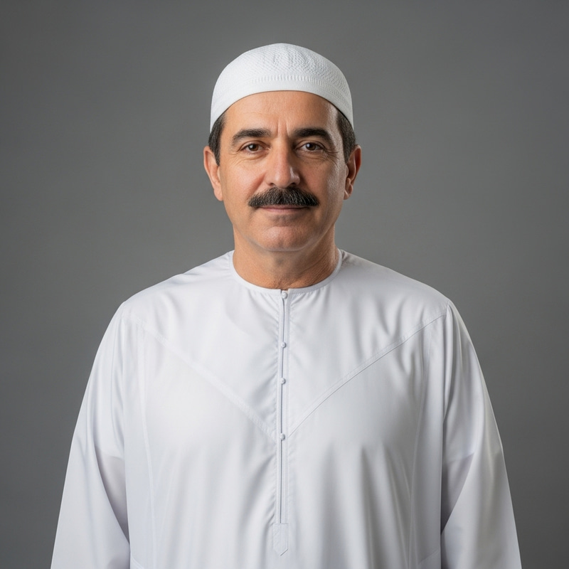 Middle-Eastern Man in Traditional Round Cap and Muslim Shirt Middle-Eastern Man in Traditional Round Cap and Muslim Shirt