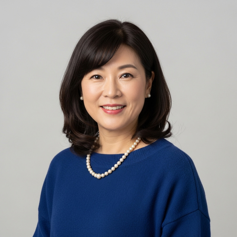 Middle Aged Asian Woman with Wide Face and Long Bob Haircut Middle Aged Asian Woman with Wide Face and Long Bob Haircut