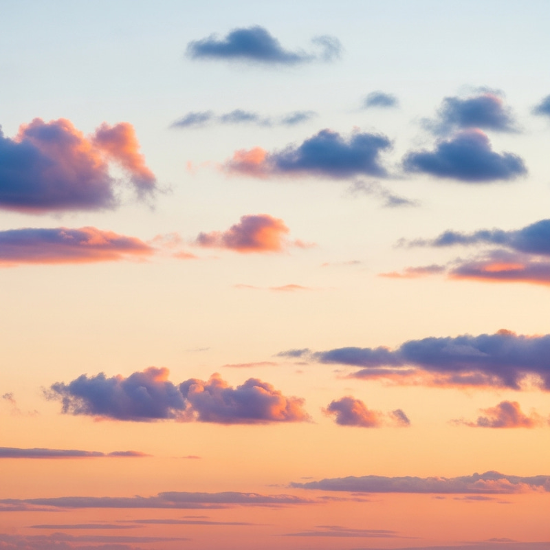 Tranquil Sunset Sky with Soft Realistic Clouds