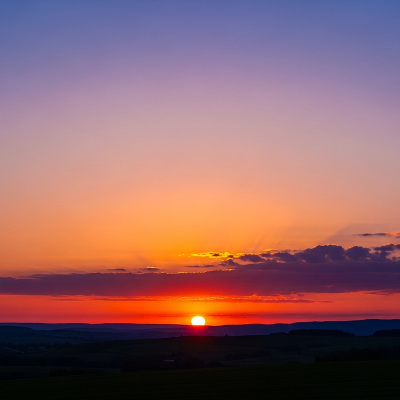 Spectacular Sunset with Vibrant Orange, Pink, and Purple Hues